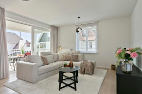 Modern new appartement with sunny terrace and parking
